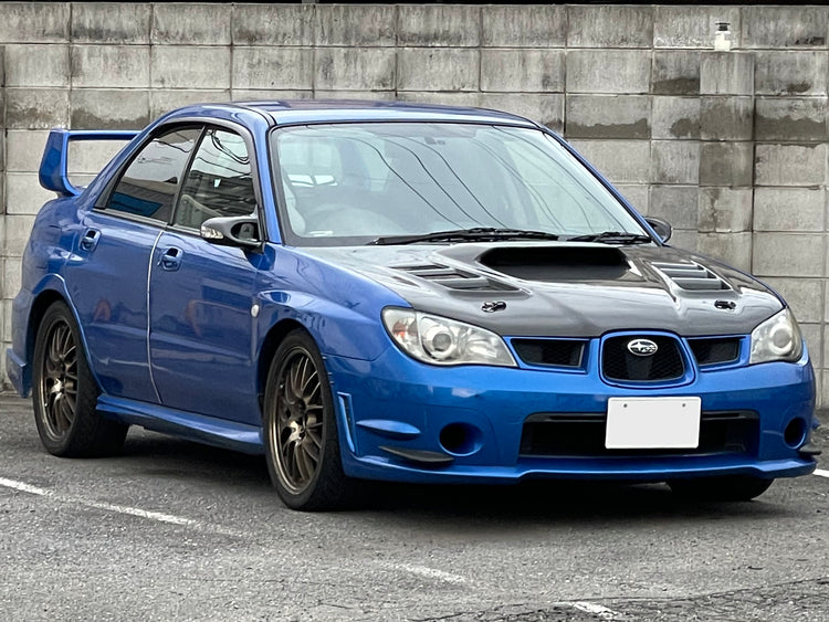Clean modified 2005 Subaru WRX 5x100 wheel fitment example