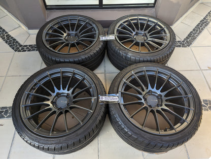 Enkei RS05RR (Dark Gunmetal Gray) with Genuine Enkei Center Caps and Tyres