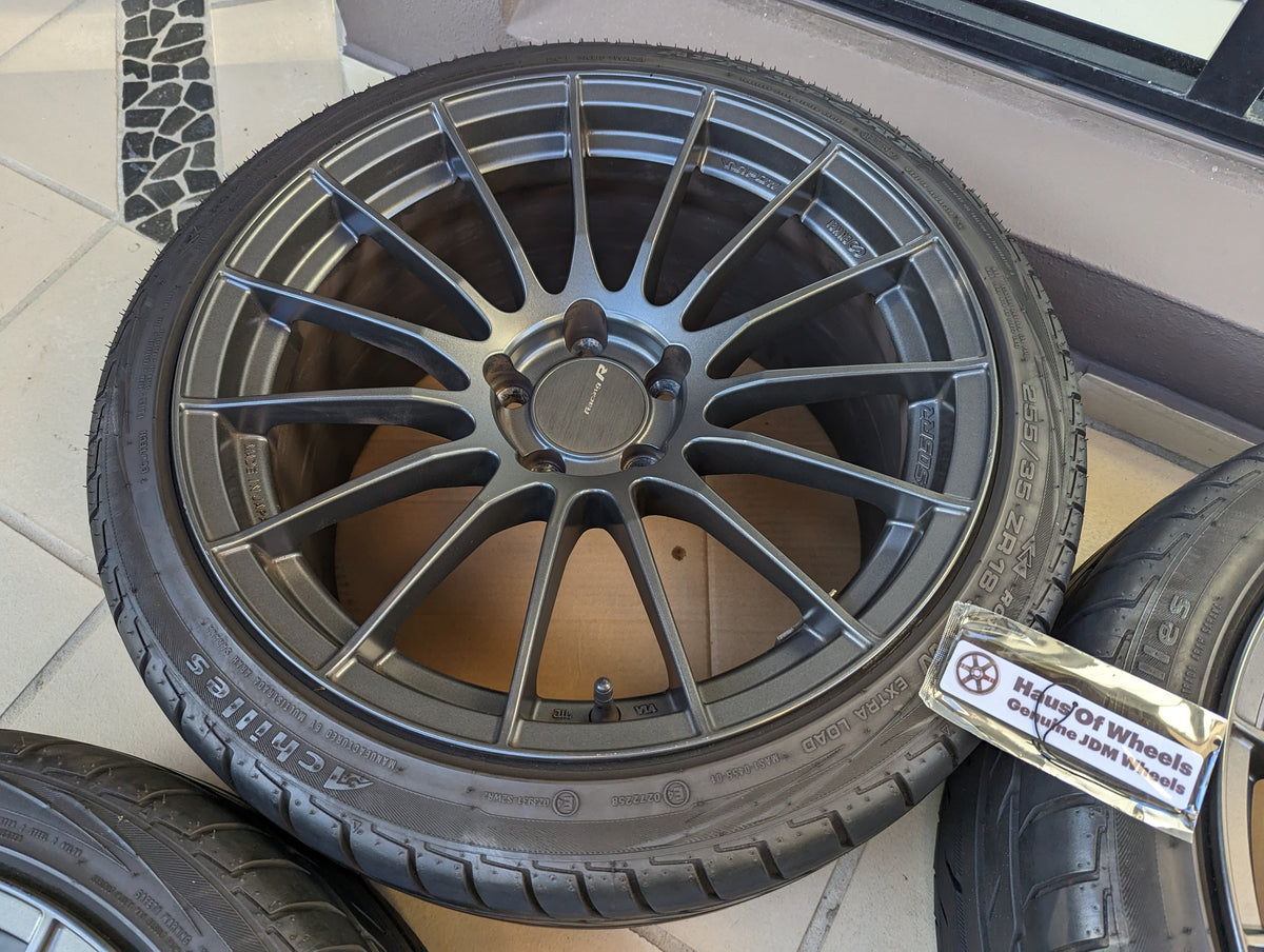 Enkei RS05RR (Dark Gunmetal Gray) with Genuine Enkei Center Caps and Tyres