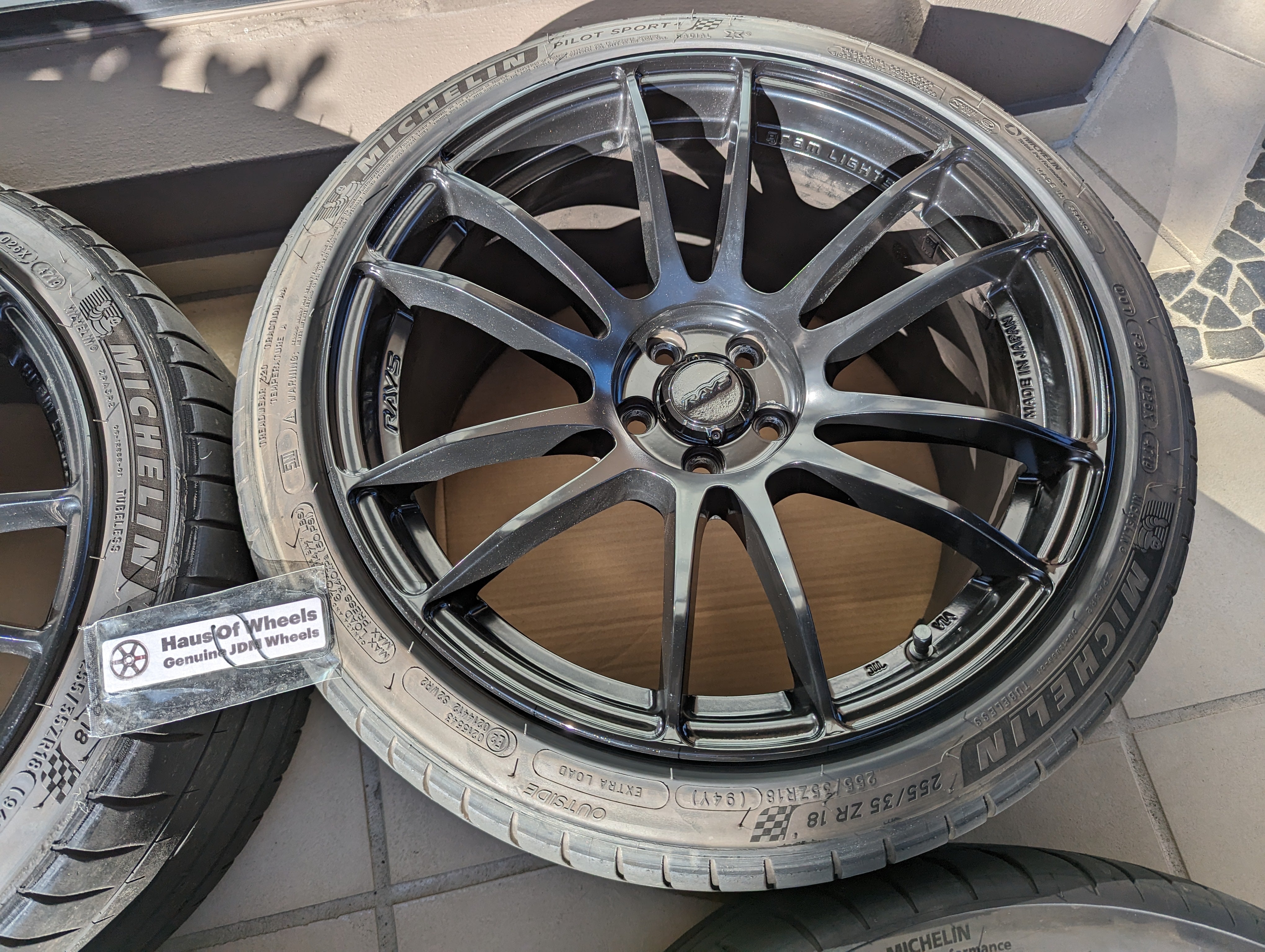 Rays Gram Lights 57XR (Gloss Black) with Genuine Rays Center Caps and Michelin Pilot Sports 4 Tyres