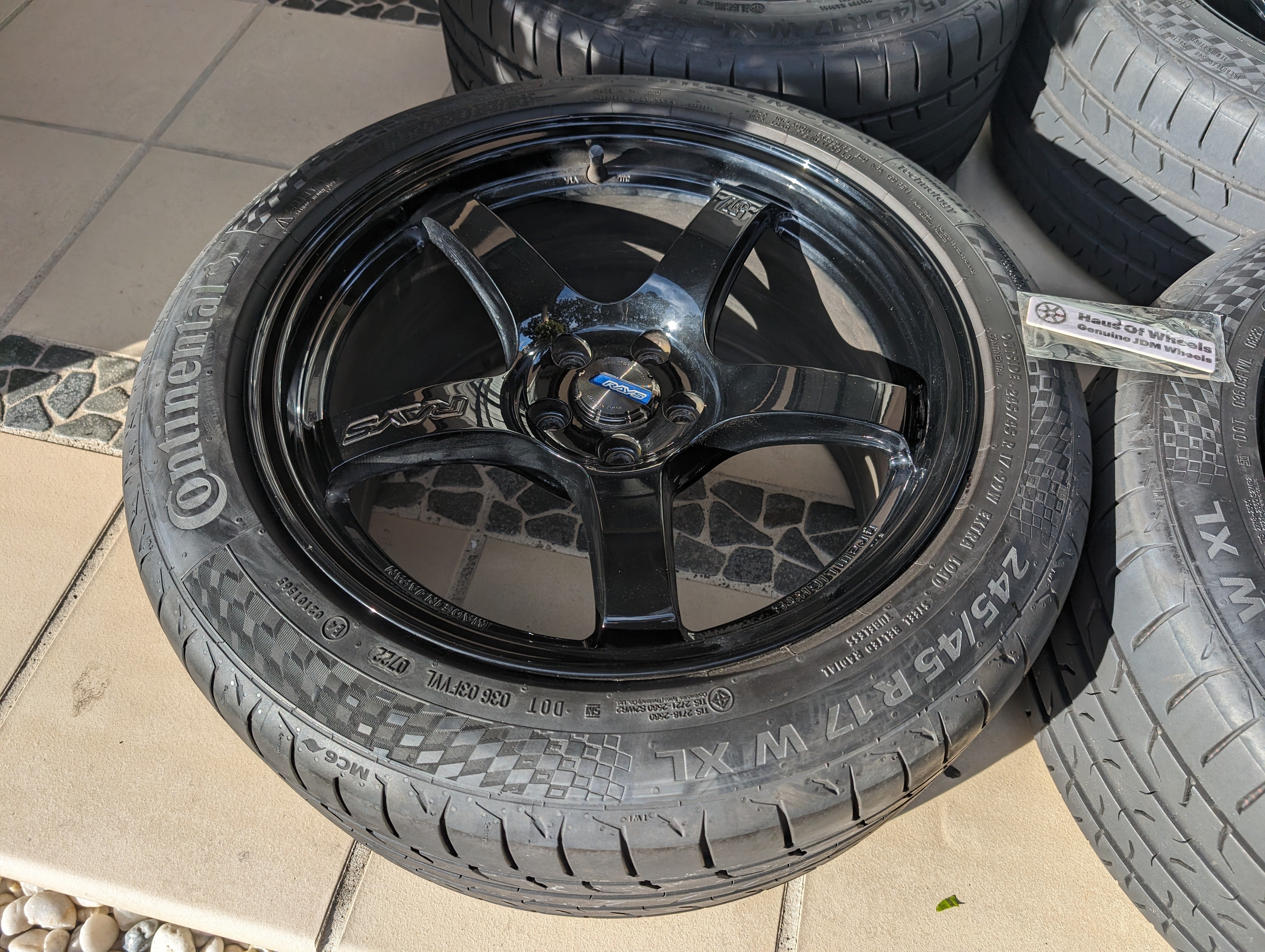 Rays Gram Light 57 CR (Gloss Black) with Near New Continental Tyres and Center Caps - 5x100 17x9 +38 (245/45/17)