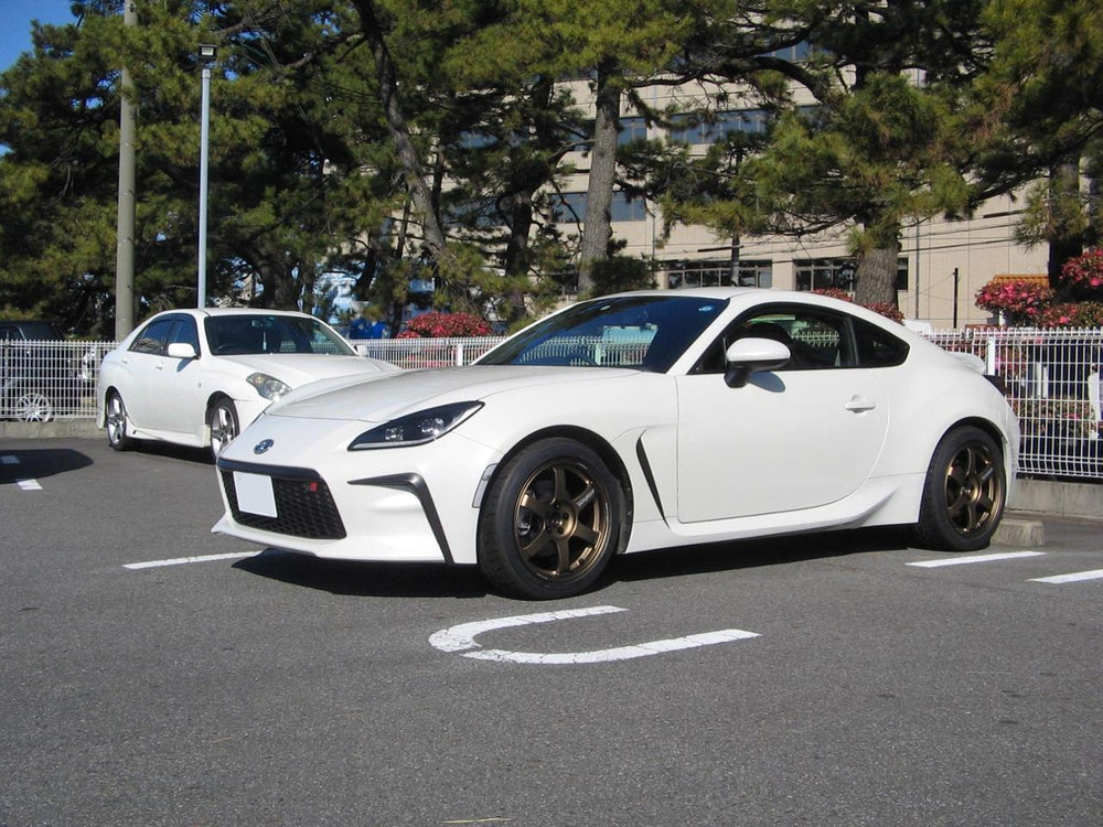 White Toyota GR86 on bronze RAYS Volk Racing TE37 wheels